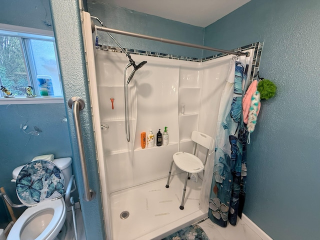 18-7862 N Lauko Rd, Mountain View, HI 96771 - full bathroom featuring a stall shower, a textured wall, and toilet