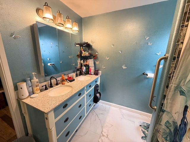 18-7862 N Lauko Rd, Mountain View, HI 96771 - full bath featuring double vanity, marble look tiles, and baseboards