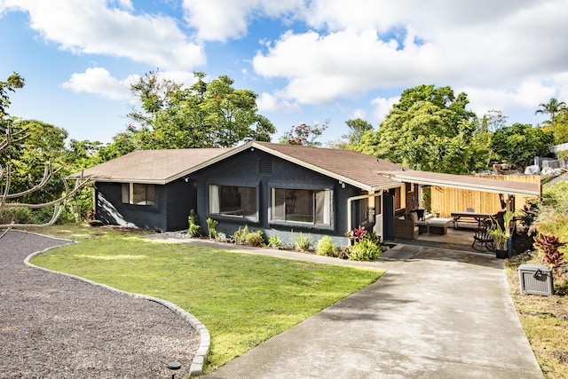 73-1099 Oluolu St, Kailua-Kona, HI 96740 - ranch-style house featuring stucco siding, driveway, and a front yard