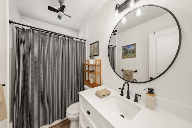 73-1099 Oluolu St, Kailua-Kona, HI 96740 - bathroom featuring toilet, vanity, ceiling fan, and curtained shower