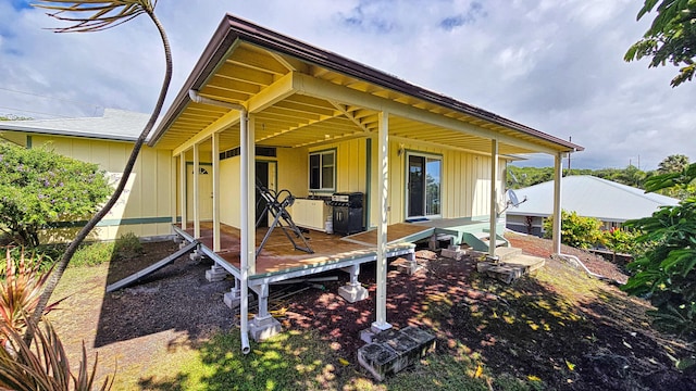 94-6663 Kamaoa Rd, Naalehu, HI 96772 - rear view of house featuring board and batten siding