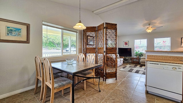 94-6663 Kamaoa Rd, Naalehu, HI 96772 - tiled dining room with ceiling fan and baseboards