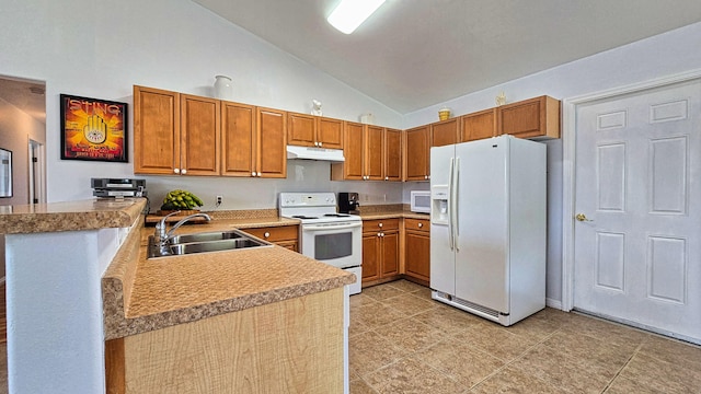 94-6663 Kamaoa Rd, Naalehu, HI 96772 - kitchen with white appliances, a sink, under cabinet range hood, a peninsula, and brown cabinets