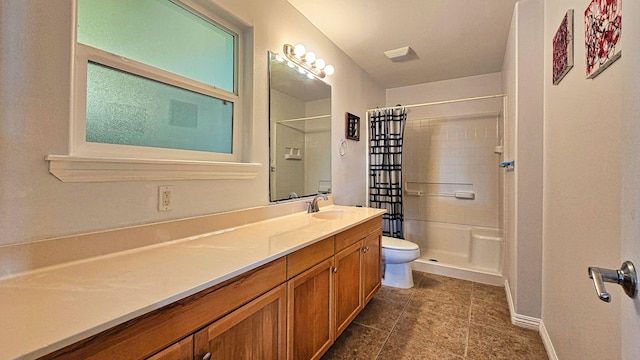 94-6663 Kamaoa Rd, Naalehu, HI 96772 - bathroom featuring toilet, vanity, a tile shower, and tile patterned flooring