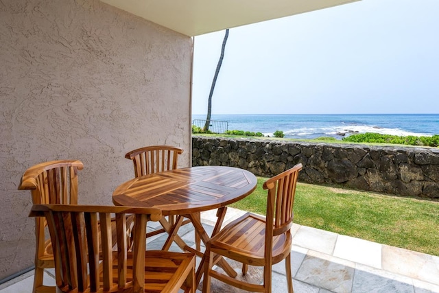 75-5888 Alii Dr Unit A4, Kailua-Kona, HI 96740 - balcony featuring a water view, outdoor dining space, and a patio