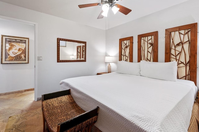 75-5888 Alii Dr Unit A4, Kailua-Kona, HI 96740 - bedroom featuring a ceiling fan and baseboards