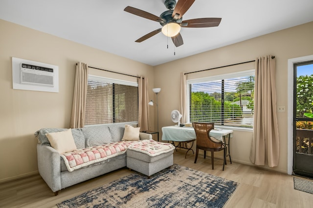 4720 Menehune Rd, Waimea, HI 96796 - living area featuring light wood finished floors, a ceiling fan, and a wall mounted AC