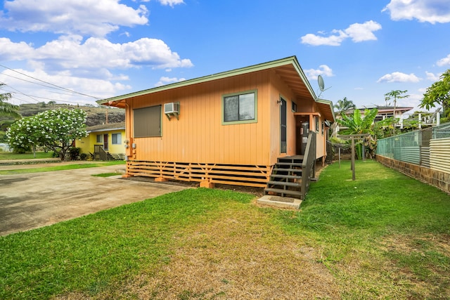 4720 Menehune Rd, Waimea, HI 96796 - view of front of house featuring an AC wall unit