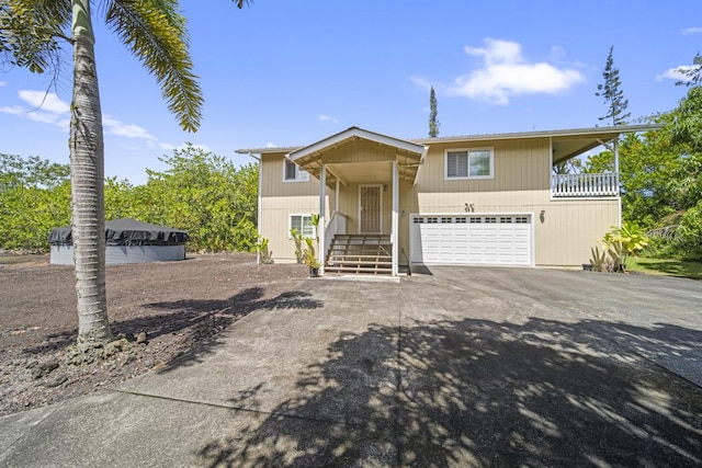 15-1663 Beach Rd, Keaau, HI 96749 - view of front of home featuring driveway and a garage