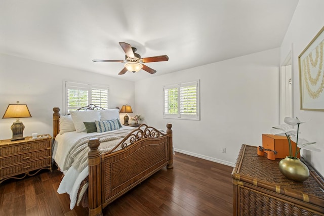 15-1663 Beach Rd, Keaau, HI 96749 - bedroom featuring multiple windows, wood finished floors, baseboards, and a ceiling fan