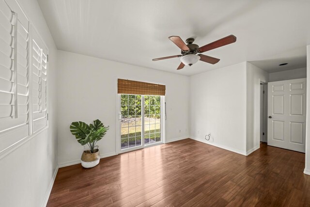 15-1663 Beach Rd, Keaau, HI 96749 - spare room with wood finished floors, a ceiling fan, and baseboards