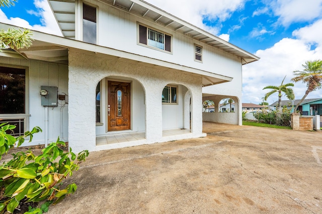 2969 Aloalo Pl, Lihue, HI 96766 - entrance to property featuring covered porch and stucco siding