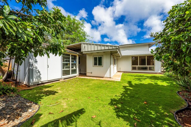 2969 Aloalo Pl, Lihue, HI 96766 - rear view of house with a yard