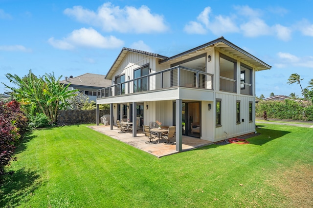 1647 Kelaukia St, Koloa, HI 96756 - rear view of house featuring a balcony and a patio