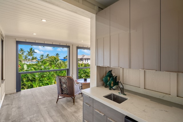 1647 Kelaukia St, Koloa, HI 96756 - kitchen featuring a sink, modern cabinets, gray cabinetry, light stone counters, and recessed lighting