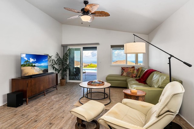 73-3725 Kaimalolo Pl, Kailua-Kona, HI 96740 - living area with lofted ceiling, wood finished floors, and a ceiling fan