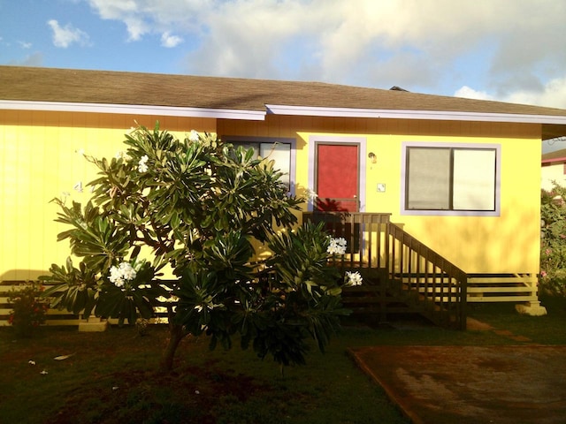 4724 Menehune Rd, Waimea, HI 96796 - doorway to property featuring a shingled roof