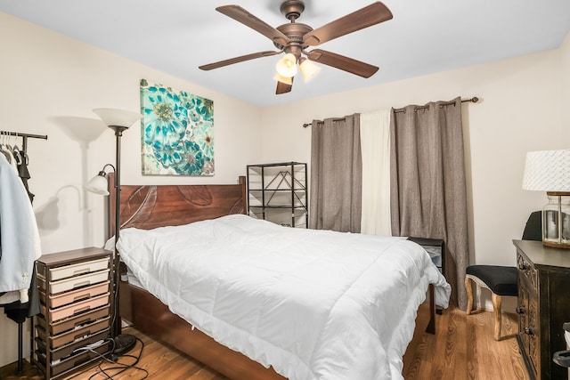 4724 Menehune Rd, Waimea, HI 96796 - bedroom with wood finished floors and a ceiling fan