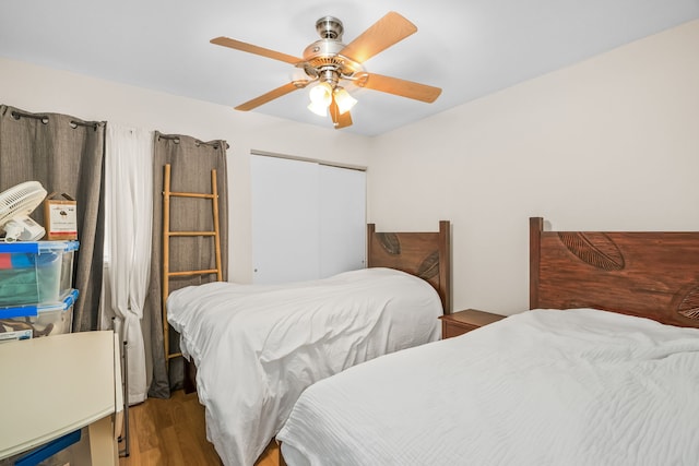 4724 Menehune Rd, Waimea, HI 96796 - bedroom featuring wood finished floors, a closet, and ceiling fan