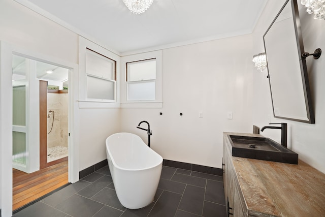 3018 Poipu Rd, Koloa, HI 96756 - bathroom featuring vanity, a soaking tub, a tile shower, tile patterned flooring, and baseboards
