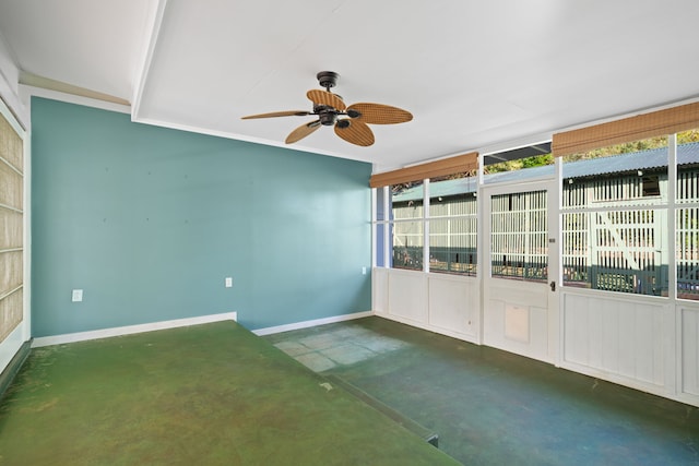 3018 Poipu Rd, Koloa, HI 96756 - spare room featuring concrete flooring, a ceiling fan, and baseboards