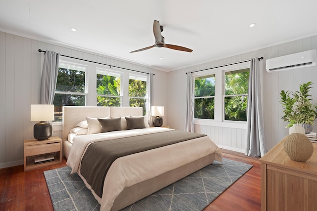 3018 Poipu Rd, Koloa, HI 96756 - bedroom with an AC wall unit, dark wood-style flooring, recessed lighting, baseboards, and a ceiling fan