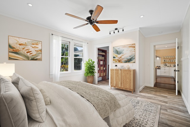 3018 Poipu Rd, Koloa, HI 96756 - bedroom featuring ornamental molding, light wood-style flooring, recessed lighting, baseboards, and a ceiling fan