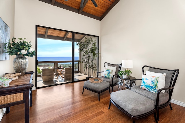 77-301 Noelani Way Unit 36, Kailua-Kona, HI 96740 - living area with wood finished floors, wood ceiling with exposed beams, high vaulted ceiling, baseboards, and a water view
