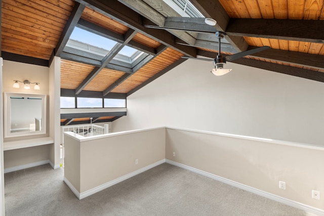 77-301 Noelani Way Unit 36, Kailua-Kona, HI 96740 - interior space featuring a skylight, carpet, wooden ceiling, and baseboards
