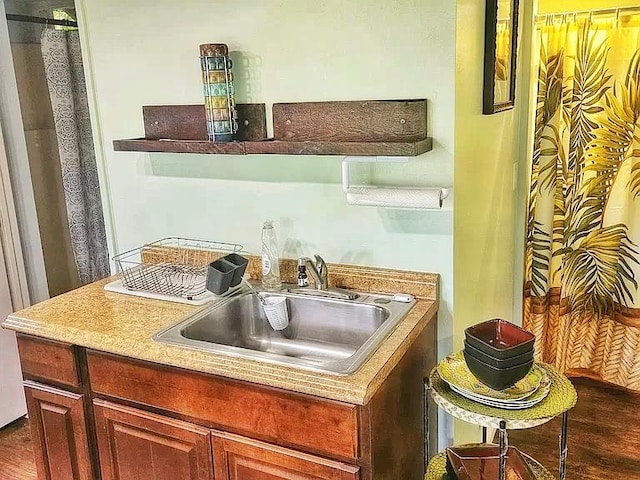 6052 Hauiki Rd Unit 1, Kapaa, HI 96746 - kitchen with a sink and dark wood-type flooring