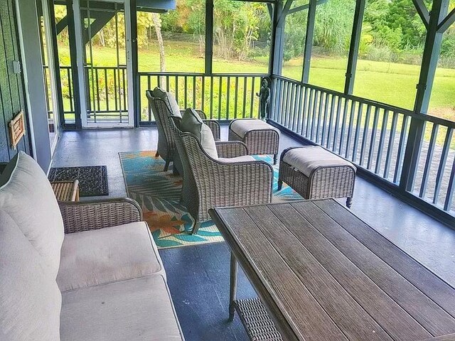 6052 Hauiki Rd Unit 1, Kapaa, HI 96746 - sunroom featuring outdoor lounge area