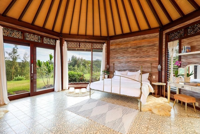 7218-C Koolau Rd, Kilauea, HI 96754 - bedroom featuring multiple windows, access to exterior, wood walls, and high vaulted ceiling