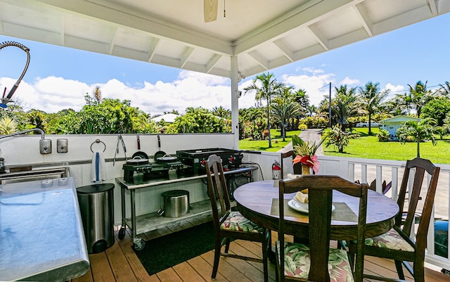 28-387 Kulaimano Rd, Pepeekeo, HI 96783 - deck featuring area for grilling, a yard, and outdoor dining area