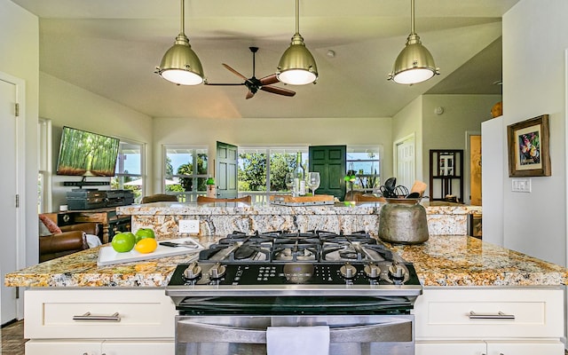 28-387 Kulaimano Rd, Pepeekeo, HI 96783 - kitchen featuring gas stove, open floor plan, ceiling fan, and white cabinetry