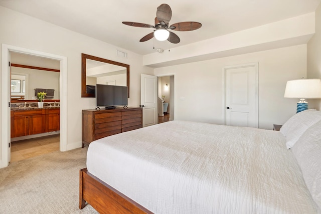 2611 Kiahuna Plantation Dr Unit 2I, Koloa, HI 96756 - bedroom with light carpet, a sink, connected bathroom, and ceiling fan