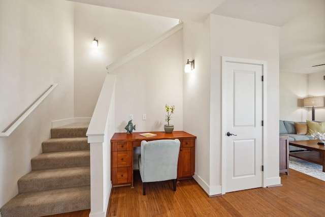 2611 Kiahuna Plantation Dr Unit 2I, Koloa, HI 96756 - staircase featuring wood finished floors and baseboards