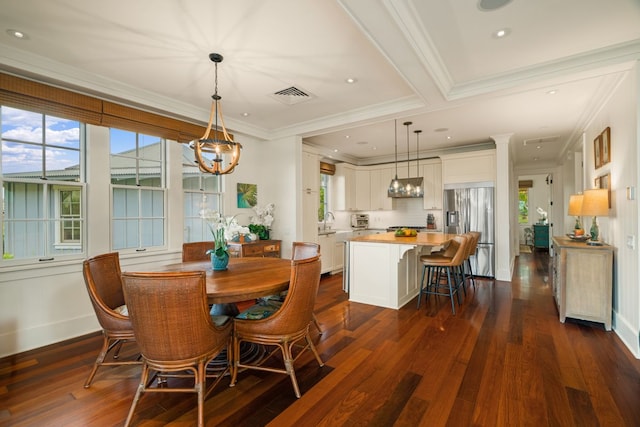 5145 Lau Nahele St, Koloa, HI 96756 - dining area featuring plenty of natural light, ornamental molding, dark wood-style floors, a chandelier, and recessed lighting
