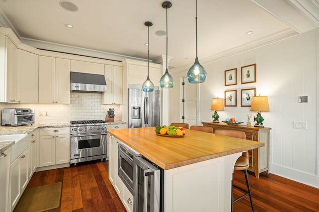 5145 Lau Nahele St, Koloa, HI 96756 - kitchen featuring appliances with stainless steel finishes, ventilation hood, butcher block countertops, dark wood-style floors, and beverage cooler