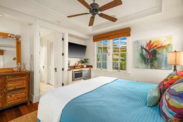 5145 Lau Nahele St, Koloa, HI 96756 - bedroom with a raised ceiling, wood finished floors, and ceiling fan