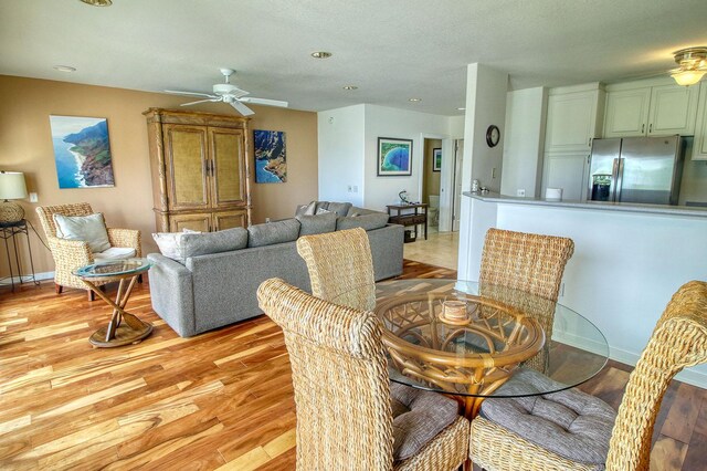 5250 Ka Haku Rd Unit 523, Princeville, HI 96722 - dining space with ceiling fan, light wood-style flooring, recessed lighting, and baseboards