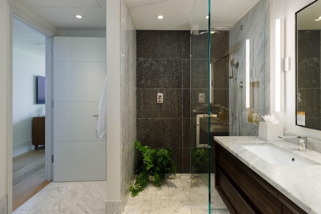 66-84 Kaunaoa Dr Unit C41, Kamuela, HI 96743 - bathroom with vanity, a tile shower, marble finish floors, and recessed lighting