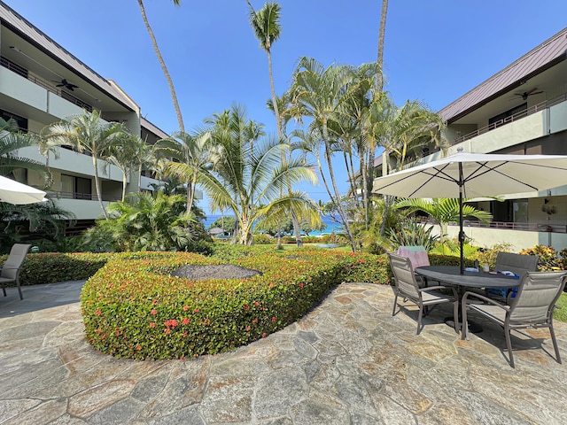 77-6469 Alii Dr Unit 128, Kailua-Kona, HI 96740 - view of patio / terrace featuring outdoor dining space
