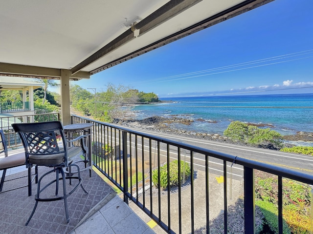 77-6311 Alii Dr Unit 306, Kailua-Kona, HI 96740 - balcony featuring view of water and beach