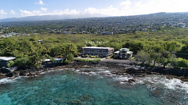 77-6311 Alii Dr Unit 301, Kailua-Kona, HI 96740 - drone / aerial view of a mountainous background and a heavily wooded area