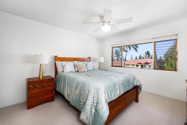 78-7054 Kamehameha Iii Rd Unit 504, Kailua-Kona, HI 96740 - carpeted bedroom featuring ceiling fan