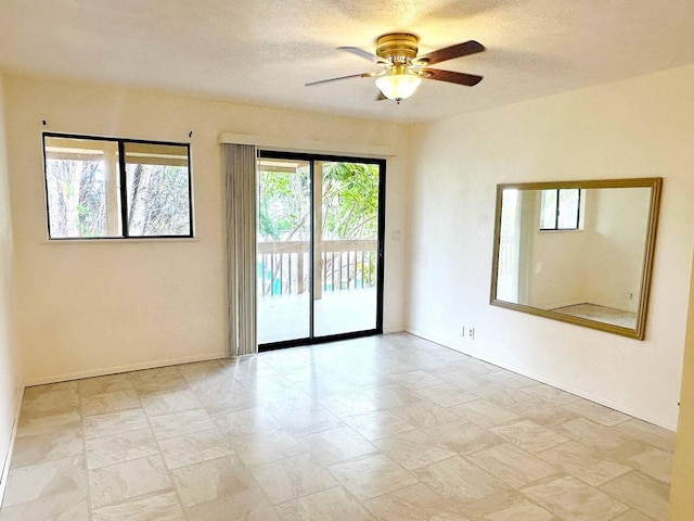 94-5826 Aouli Pl, Naalehu, HI 96772 - spare room with a ceiling fan and a textured ceiling