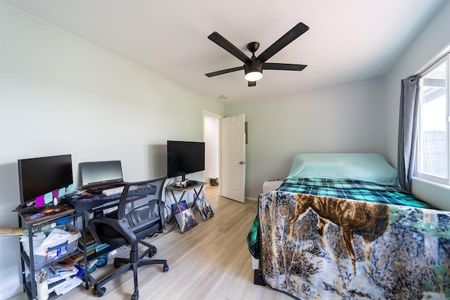 15-2806 Manalo St, Pahoa, HI 96778 - bedroom featuring light wood finished floors, an office area, a ceiling fan, and baseboards