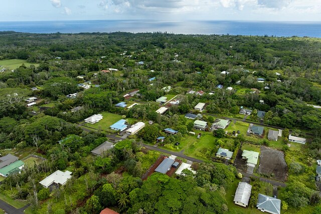 15-2806 Manalo St, Pahoa, HI 96778 - aerial view of property and surrounding area featuring a large body of water and a forest