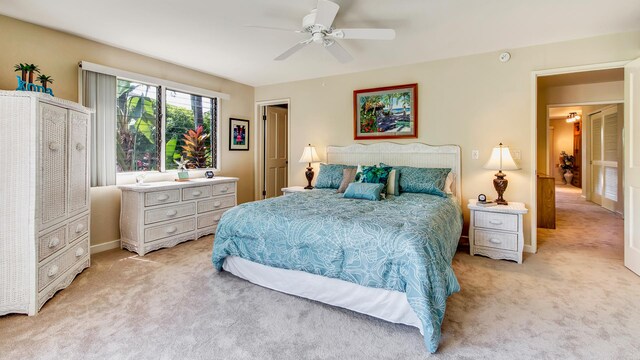 78-261 Manukai St Unit 3501, Kailua-Kona, HI 96740 - bedroom with light carpet, ceiling fan, and baseboards