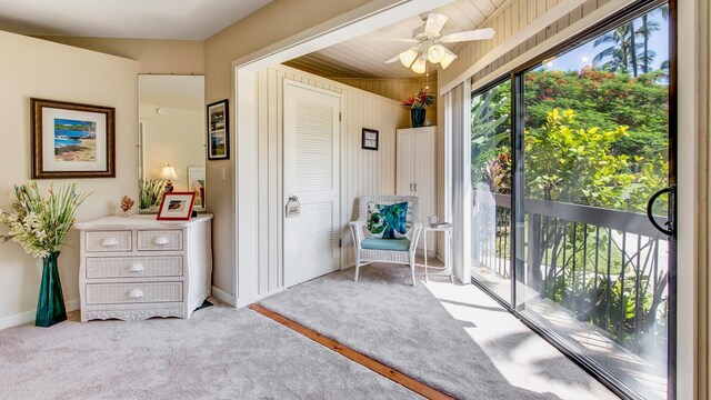 78-261 Manukai St Unit 3501, Kailua-Kona, HI 96740 - living area with a ceiling fan, carpet floors, and baseboards
